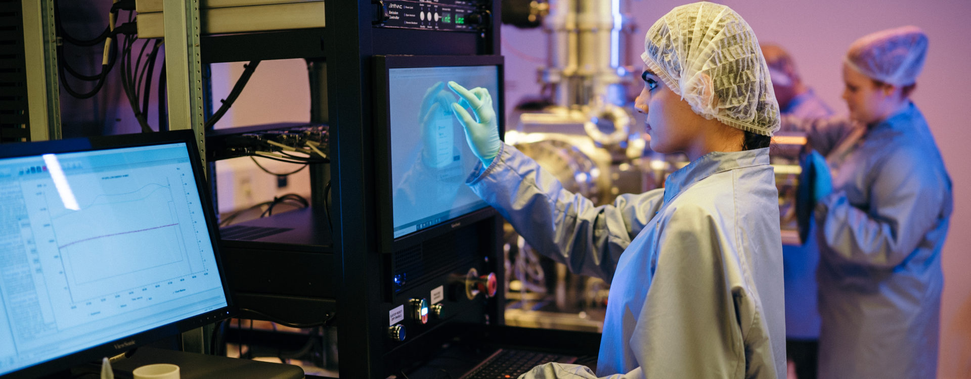 Ritika using technology in the clean room at UTS